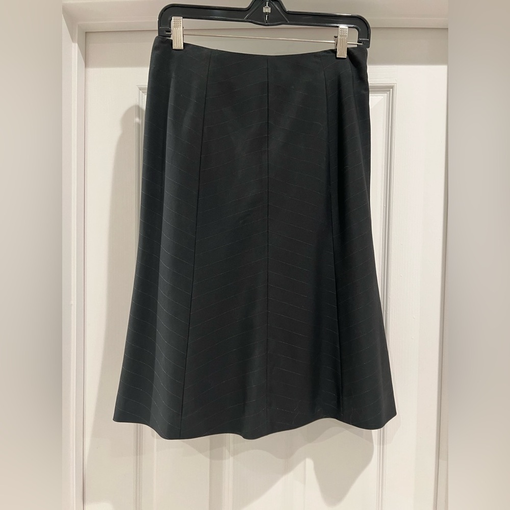 This is a black Halogen A-line Skirt. Size 4.